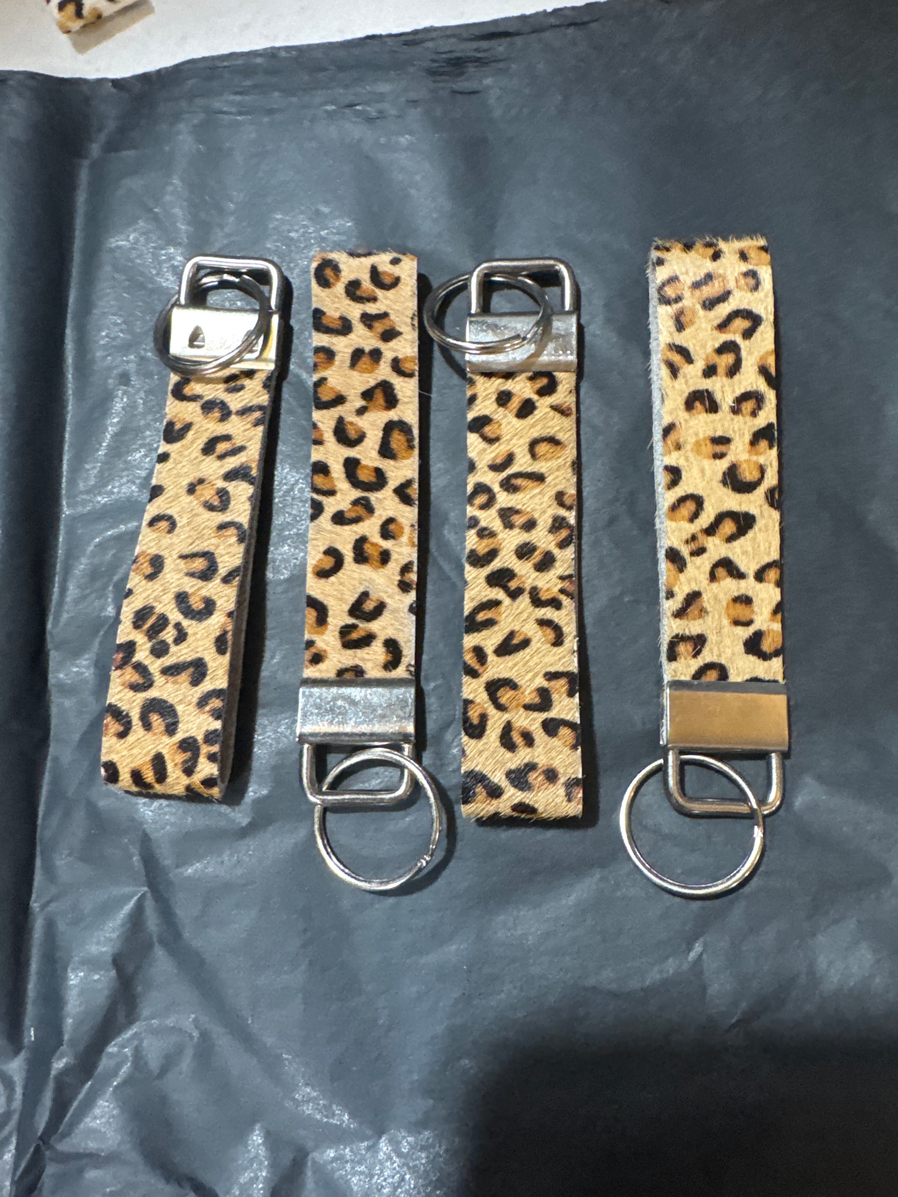 Animal print faux fur mini wristlets